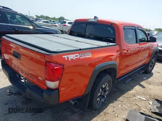 2017 Toyota Tacoma SR5 with VIN 5TFCZ5AN4HX091383, listed as a IAAI auction lot 42202505 with 82,000 mi miles and . Bid and sale history available at DreamBid. Image 4.