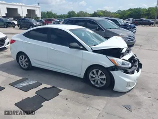 2014 Hyundai Accent GLS with VIN KMHCU4AE6EU766796, listed as a IAAI auction lot 41933743 with 99,142 mi miles. Bid and sale history available at carsss.com. Image 1.