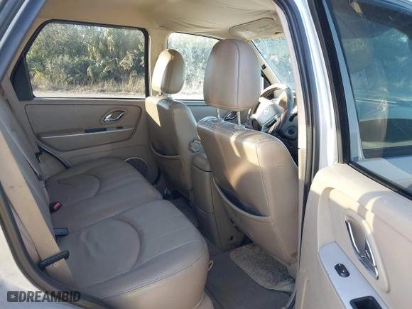 2005 Mercury Mariner Luxury with VIN 4M2CU57115DJ11387, listed as a IAAI auction lot 41267614 with 166,448 mi miles. Bid and sale history available at carsss.com. Image 8.