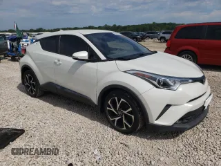 2018 Toyota C-HR XLE with VIN NMTKHMBXXJR041607, listed as a Copart auction lot 60540654 with 84,228 mi miles and Salvage Title. Bid and sale history available at DreamBid. Image 4.