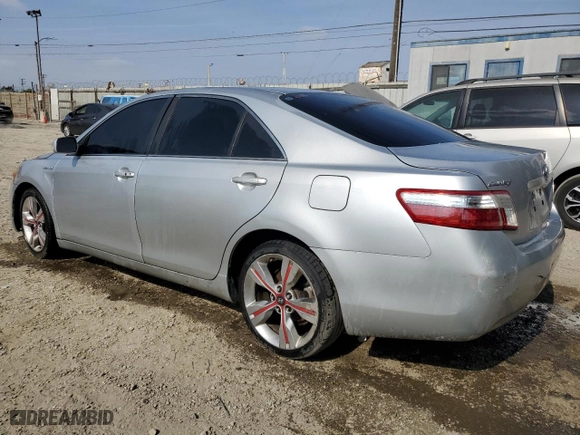 2007 Toyota Camry Hybrid with VIN JTNBB46K073036990, listed as a Copart auction lot 54250035 with 198,952 mi miles and Clean Title. Bid and sale history available at carsss.com. Image 2.