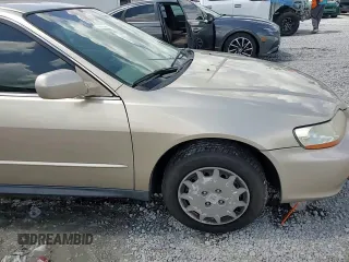 2001 Honda Accord LX z VIN JHMCG56401C022403, wystawiony jako Copart lot #60021165 z przebiegiem 119 114 mil mil oraz Szkoda całkowita • Salvage title. Historia ofert i sprzedaży dostępna na DreamBid. Obrazek 14.