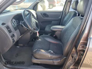 2002 Ford Escape XLS Choice with VIN 1FMYU021X2KC77142, listed as a Copart auction lot 77036384 with 213,292 mi miles and Clean title. Bid and sale history available at DreamBid. Image 7.