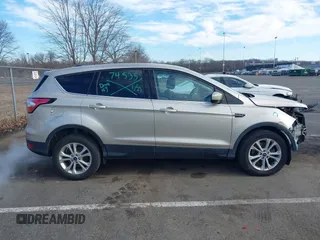 2017 Ford Escape SE with VIN 1FMCU9GD6HUD07252, listed as a IAAI auction lot 41584876 with 83,556 mi miles. Bid and sale history available at carsss.com. Image 13.