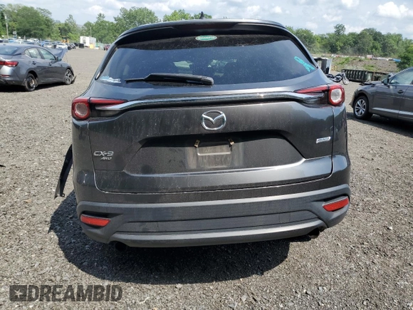 2019 Mazda CX-9 Touring z VIN JM3TCBCY5K0328655, wystawiony jako Copart lot #64627255 z przebiegiem 54 658 mil mil oraz Szkoda całkowita • Salvage title. Historia ofert i sprzedaży dostępna na DreamBid. Obrazek 6.