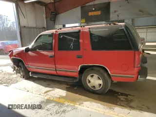 1999 GMC Yukon with VIN 1GKEK13R0XJ768859, listed as a Copart auction lot 84005304 with 190,960 mi miles and Salvage Title. Bid and sale history available at carsss.com. Image 2.