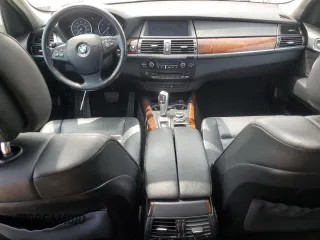 2012 BMW X5 35i with VIN 5UXZV4C54CL763857, listed as a Copart auction lot 57943195 with 143,522 mi miles and Salvage title. Bid and sale history available at DreamBid. Image 8.