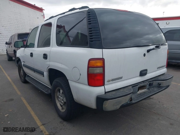 2003 Chevrolet Tahoe Z71 with VIN 1GNEK13T03R247814, listed as a IAAI auction lot 41026670 with 143,990 mi miles. Bid and sale history available at carsss.com. Image 3.