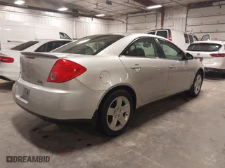 2009 Pontiac G6 w/1SA *Ltd Avail* with VIN 1G2ZG57B094155004, listed as a IAAI auction lot 41925584 with 123,169 mi miles. Bid and sale history available at carsss.com. Image 4.