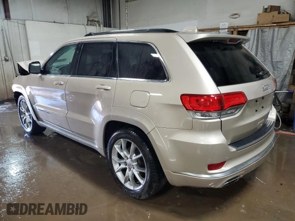 2015 Jeep Grand Cherokee Summit z VIN 1C4RJFJG1FC628532, wystawiony jako Copart lot #52546755 z przebiegiem 107 700 mil mil oraz Szkoda całkowita • Salvage title. Historia ofert i sprzedaży dostępna na DreamBid. Obrazek 2.