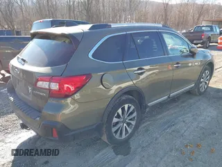 2019 Subaru Outback Touring with VIN 4S4BSATC7K3272301, listed as a IAAI auction lot 41318172 with 102,417 mi miles and . Bid and sale history available at DreamBid. Image 4.