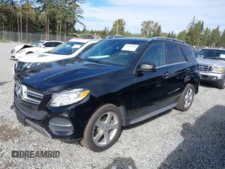2016 Mercedes-Benz GLE 350 with VIN 4JGDA5JB5GA801020, listed as a IAAI auction lot 40442864 with 61,636 mi miles and . Bid and sale history available at DreamBid. Image 2.