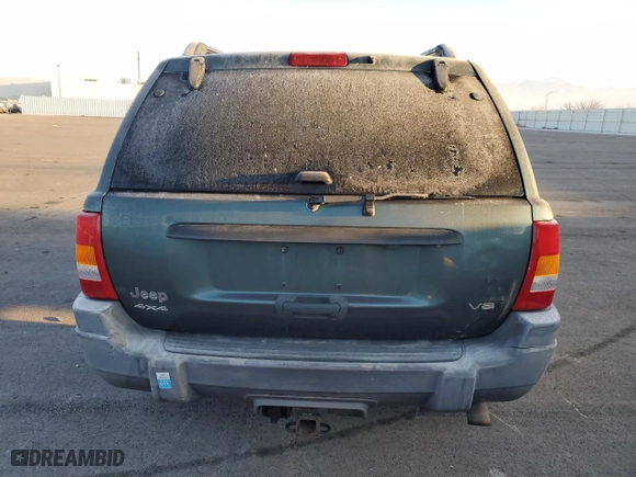 2002 Jeep Grand Cherokee Laredo with VIN 1J4GW48N72C155063, listed as a Copart auction lot 82839234 with 165,397 mi miles and Clean Title. Bid and sale history available at carsss.com. Image 6.