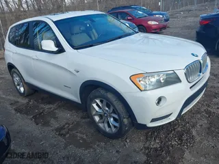 2011 BMW X3 28i with VIN 5UXWX5C52BLK59471, listed as a IAAI auction lot 41245998 with 216,204 mi miles. Bid and sale history available at carsss.com. Image 1.