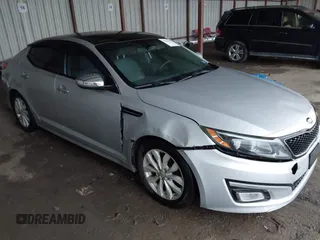 2014 Kia Optima EX z VIN 5XXGN4A77EG290424, wystawiony jako IAAI lot #42165140 z przebiegiem 104 066 mil mil oraz . Historia ofert i sprzedaży dostępna na DreamBid. Obrazek 1.