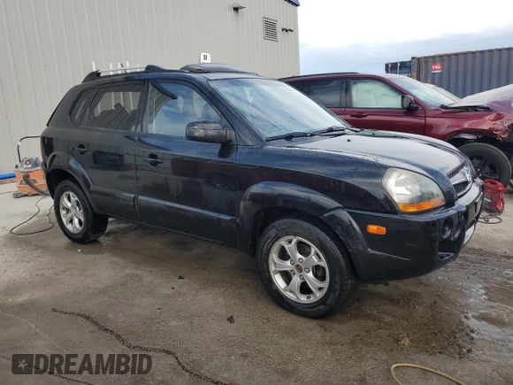 2009 Hyundai Tucson SE with VIN KM8JN72D69U974579, listed as a Copart auction lot 76964564 with 98,569 mi miles and Non Repairable. Bid and sale history available at carsss.com. Image 4.