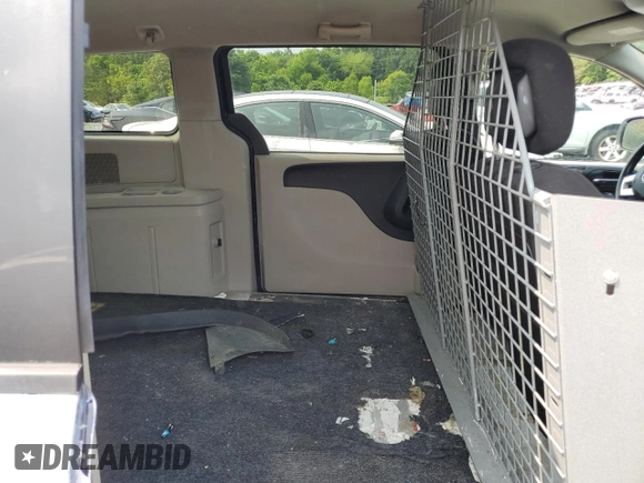 2013 Ram Cargo Van Tradesman с VIN 2C4JRGAG3DR703392, выставлен на аукционе Copart как лот 59021195 с пробегом 169 015 миль миль и Списание • Salvage title. История ставок и продаж доступна на DreamBid. Изображение 11.