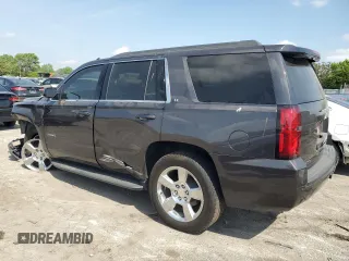 2016 Chevrolet Tahoe LT with VIN 1GNSKBKC8GR438834, listed as a Copart auction lot 57151045 with 129,234 mi miles and Salvage title. Bid and sale history available at DreamBid. Image 2.