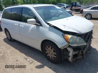2009 Honda Odyssey Touring with VIN 5FNRL38829B014152, listed as a IAAI auction lot 42160341 with 206,532 mi miles and . Bid and sale history available at DreamBid. Image 1.