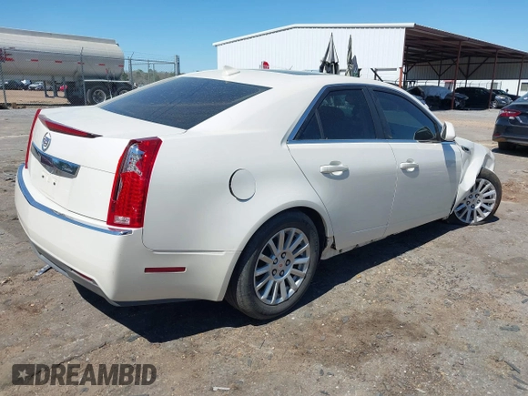 2012 Cadillac CTS z VIN 1G6DA5E51C0151324, wystawiony jako IAAI lot #41811207 z przebiegiem 100 407 mil mil oraz . Historia ofert i sprzedaży dostępna na DreamBid. Obrazek 4.