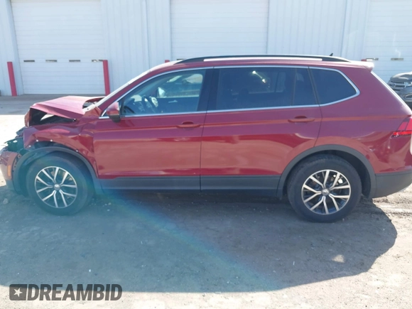2019 Volkswagen Tiguan SE with VIN 3VV3B7AX3KM130075, listed as a IAAI auction lot 41807584 with 57,308 mi miles and . Bid and sale history available at DreamBid. Image 14.