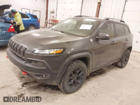 2015 Jeep Cherokee Trailhawk с VIN 1C4PJMBSXFW525218, выставлен на аукционе IAAI как лот 42032130 с пробегом 164 289 миль миль и . История ставок и продаж доступна на DreamBid. Изображение 17.