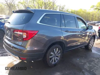 2019 Honda Pilot EX-L with VIN 5FNYF6H54KB038176, listed as a IAAI auction lot 42039560 with 52,404 mi miles and . Bid and sale history available at carsss.com. Image 4.