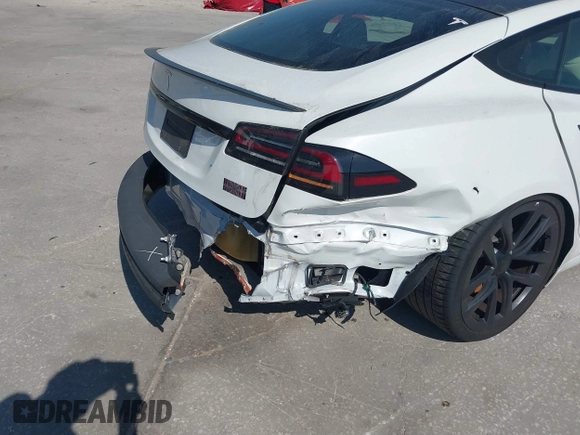 2022 Tesla Model S Plaid with VIN 5YJSA1E64NF484904, listed as a IAAI auction lot 41594464 with 25,299 mi miles and . Bid and sale history available at DreamBid. Image 6.