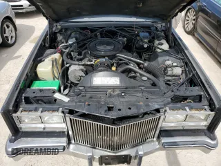 1985 Cadillac Eldorado z VIN 1G6EL578XFE614641, wystawiony jako Copart lot #75663984 z przebiegiem 54 128 mil mil oraz Szkody całkowita. Historia ofert i sprzedaży dostępna na DreamBid. Obrazek 11.