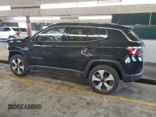 2020 Jeep Compass Latitude with VIN 3C4NJDBB3LT258349, listed as a Copart auction lot 61452715 with 80,933 mi miles and Salvage title. Bid and sale history available at DreamBid. Image 2.