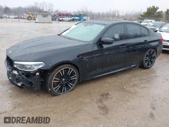 2020 BMW M5 Competition z VIN WBSJF0C00LCD37331, wystawiony jako IAAI lot #41738410 z przebiegiem 49 788 mil mil oraz . Historia ofert i sprzedaży dostępna na DreamBid. Obrazek 2.