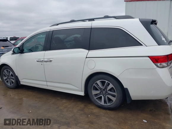 2016 Honda Odyssey Touring Elite with VIN 5FNRL5H9XGB100116, listed as a IAAI auction lot 41543464 with 160,763 mi miles and . Bid and sale history available at DreamBid. Image 14.