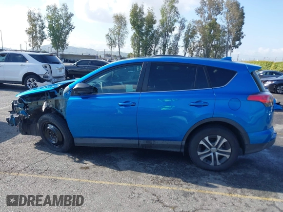 2018 Toyota RAV4 LE with VIN 2T3ZFREV9JW442691, listed as a IAAI auction lot 41946423 with 133,856 mi miles. Bid and sale history available at carsss.com. Image 15.