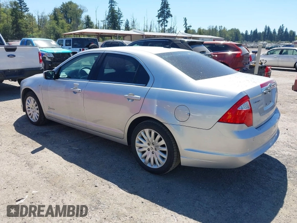 2012 Ford Fusion Hybrid z VIN 3FADP0L3XCR380817, wystawiony jako IAAI lot #42755712 z przebiegiem 81 220 mil mil oraz . Historia ofert i sprzedaży dostępna na DreamBid. Obrazek 3.