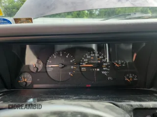 1994 Jeep Grand Cherokee Laredo z VIN 1J4GZ58S0RC221854, wystawiony jako Copart lot #61950825 z przebiegiem 69 465 mil mil oraz Czysty tytuł • Clean title. Historia ofert i sprzedaży dostępna na DreamBid. Obrazek 9.