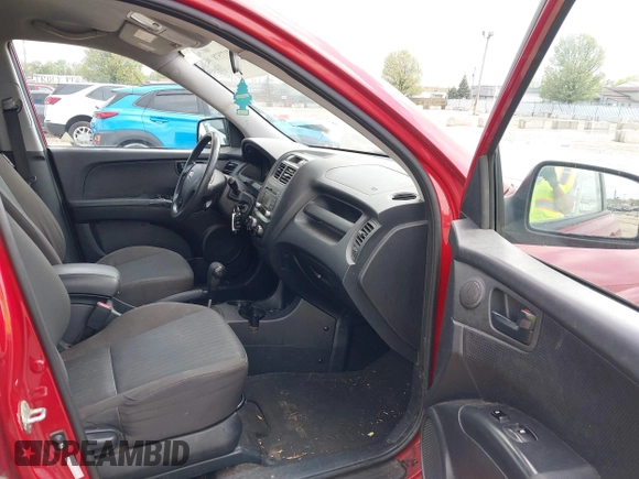 2010 Kia Sportage LX with VIN KNDKG3A47A7692127, listed as a IAAI auction lot 42177578 with 157,569 mi miles and . Bid and sale history available at carsss.com. Image 5.