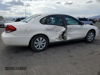 2006 Ford Taurus SE с VIN 1FAFP53U96A187491, выставлен на аукционе Copart как лот 55109005 с пробегом 121 856 миль миль и Списание • Salvage title. История ставок и продаж доступна на DreamBid. Изображение 3.