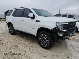 2021 GMC Yukon AT4 with VIN 1GKS2CKD1MR287374, listed as a Copart auction lot 44615715 with 57,552 mi miles and Salvage Title. Bid and sale history available at carsss.com. Image 4.