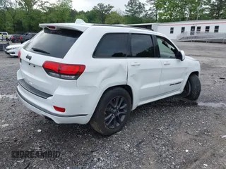 2018 Jeep Grand Cherokee High Altitude z VIN 1C4RJECG0JC223424, wystawiony jako IAAI lot #42116920 z przebiegiem 122 884 mil mil oraz . Historia ofert i sprzedaży dostępna na DreamBid. Obrazek 4.