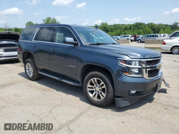 2020 Chevrolet Tahoe LT with VIN 1GNSKBKC0LR260766, listed as a Copart auction lot 61465725 with 104,850 mi miles and Salvage title. Bid and sale history available at DreamBid. Image 4.