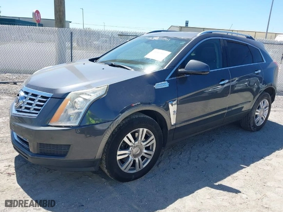 2013 Cadillac SRX Luxury Collection with VIN 3GYFNGE35DS610590, listed as a IAAI auction lot 41889588 with 172,769 mi miles. Bid and sale history available at carsss.com. Image 2.