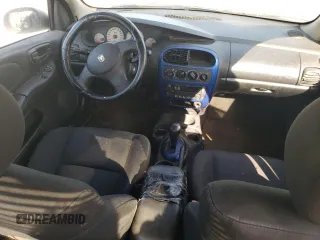 2004 Dodge Neon SXT with VIN 1B3ES56C24D504712, listed as a Copart auction lot 71676674 with Not Provided miles and Salvage Title. Bid and sale history available at carsss.com. Image 8.