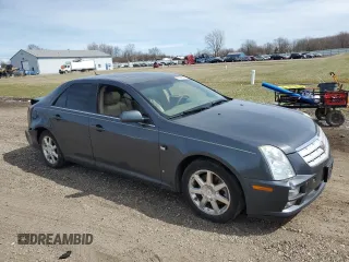 2007 Cadillac STS z VIN 1G6DW677970160672, wystawiony jako Copart lot #50568525 z przebiegiem 127 699 mil mil oraz Szkody całkowita. Historia ofert i sprzedaży dostępna na DreamBid. Obrazek 4.