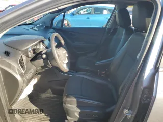 2020 Chevrolet Trax LT z VIN 3GNCJLSB7LL321218, wystawiony jako Copart lot #79774344 z przebiegiem Nie podano mil oraz Szkody całkowita. Historia ofert i sprzedaży dostępna na DreamBid. Obrazek 7.