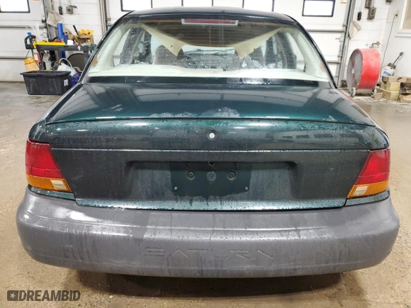 1996 Saturn SL with VIN 1G8ZH5284TZ379272, listed as a Copart auction lot 72447734 with 73,264 mi miles and Non Repairable. Bid and sale history available at carsss.com. Image 6.