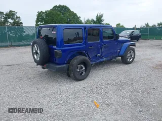 2019 Jeep Wrangler Unlimited Sahara with VIN 1C4HJXEG1KW599117, listed as a IAAI auction lot 42602241 with 109,552 mi miles and . Bid and sale history available at DreamBid. Image 4.