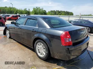 2009 Chrysler 300 LX with VIN 2C3KA43D49H615515, listed as a Copart auction lot 52409715 with 209,912 mi miles and Salvage Title. Bid and sale history available at carsss.com. Image 2.