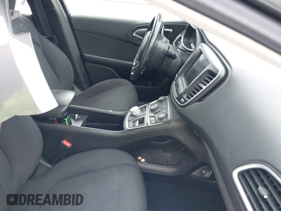 2015 Chrysler 200 Limited with VIN 1C3CCCAG5FN605570, listed as a IAAI auction lot 41246742 with 142,574 mi miles. Bid and sale history available at carsss.com. Image 5.