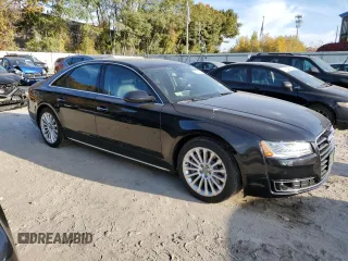 2015 Audi A8 z VIN WAUJGAFD7FN032176, wystawiony jako Copart lot #76943904 z przebiegiem 126 423 mil mil oraz Czysty tytuł • Clean title. Historia ofert i sprzedaży dostępna na DreamBid. Obrazek 4.