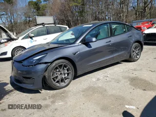 2022 Tesla Model 3 with VIN 5YJ3E1EA5NF339769, listed as a Copart auction lot 47111685 with 44,087 mi miles and Salvage Title. Bid and sale history available at DreamBid. Image 1.